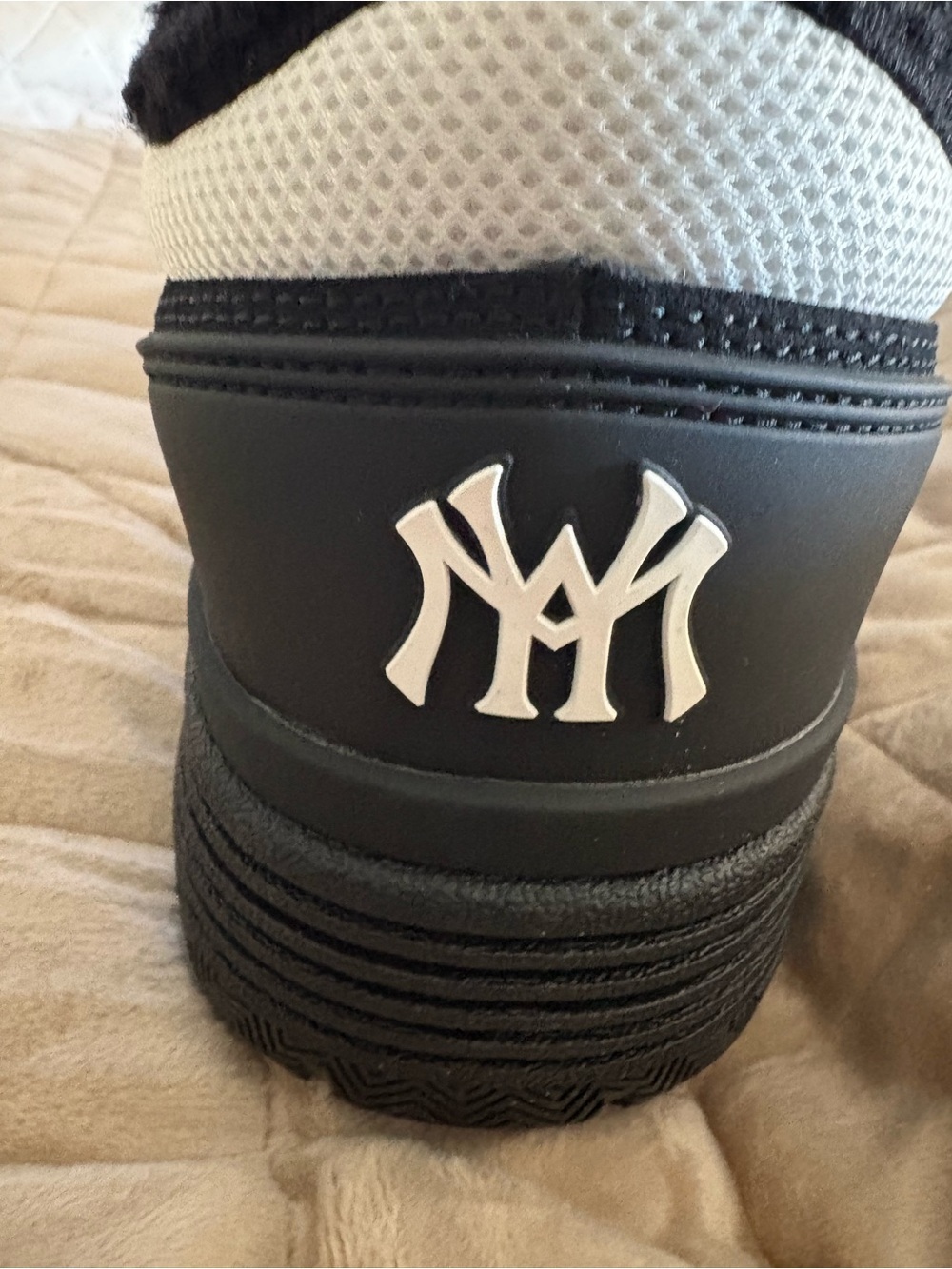 Men’s Black and White Athletic Shoe with Raised Emblem